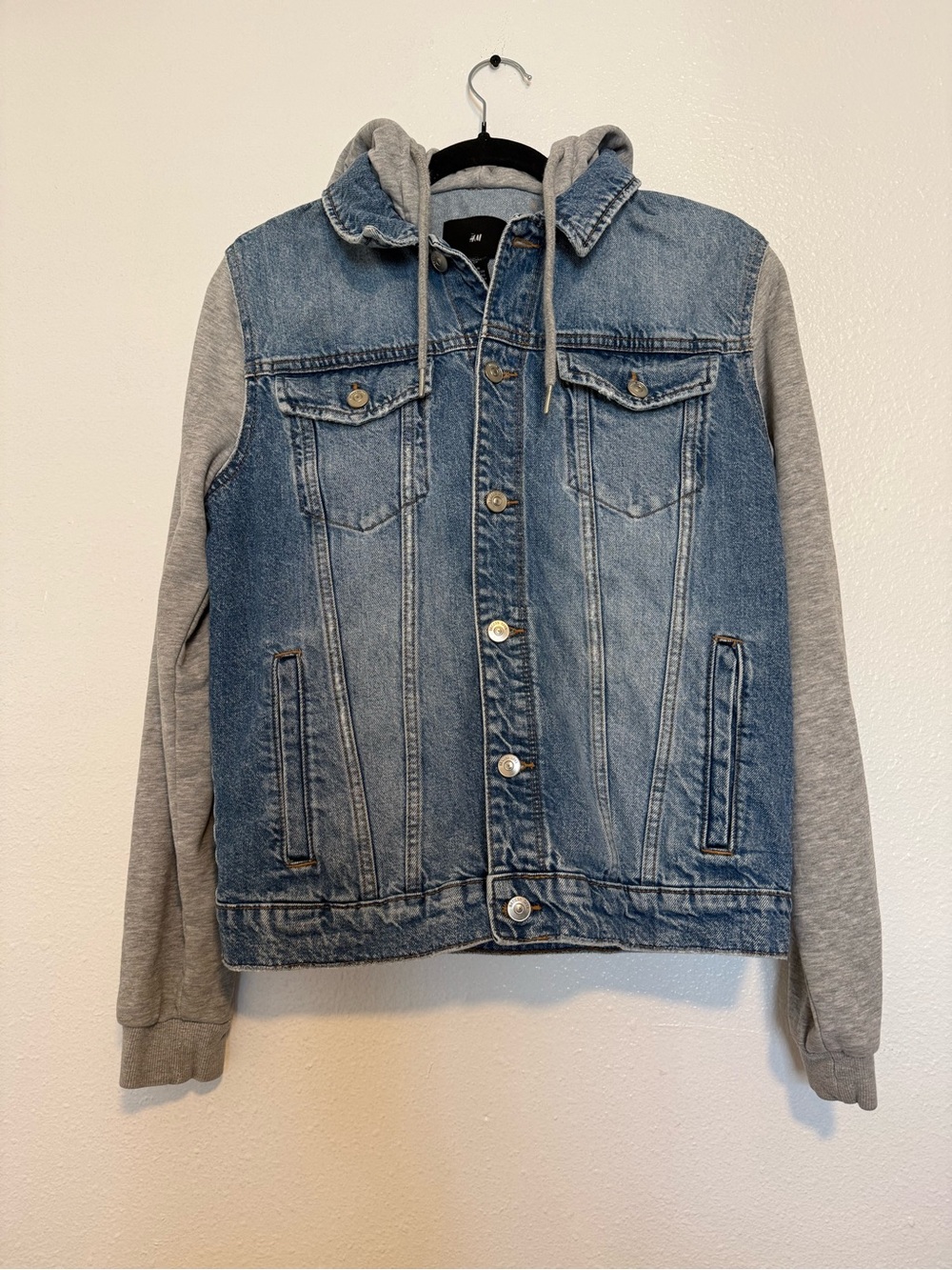 H&M blue denim jacket with gray hoodie lining, size S